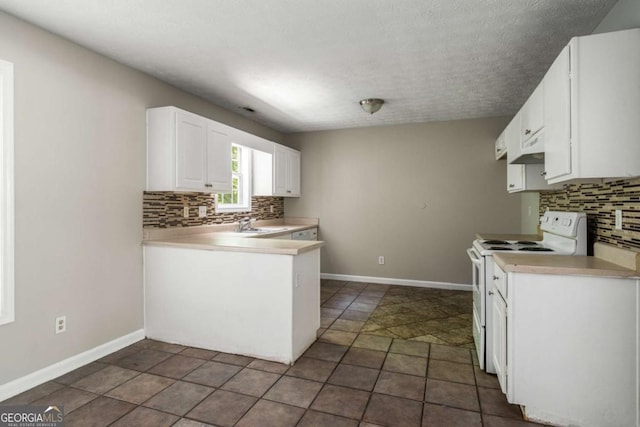 175 Hearth Way, Fairburn, GA 30213 - kitchen featuring white electric range oven, backsplash, and baseboards