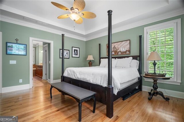 15 Sconti Knoll Dr, Jasper, GA 30143 - bedroom with a tray ceiling, wood finished floors, ornamental molding, baseboards, and ceiling fan