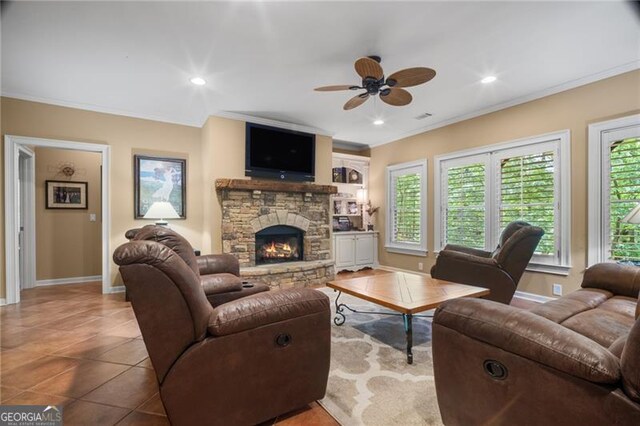 15 Sconti Knoll Dr, Jasper, GA 30143 - tiled living area featuring a ceiling fan, baseboards, ornamental molding, plenty of natural light, and a fireplace
