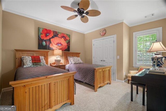 15 Sconti Knoll Dr, Jasper, GA 30143 - bedroom featuring light colored carpet, ornamental molding, a closet, baseboards, and a ceiling fan