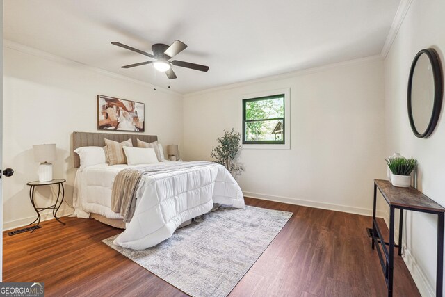3708 Canadian Way, Tucker, GA 30084 - bedroom with dark wood finished floors, ornamental molding, baseboards, and ceiling fan