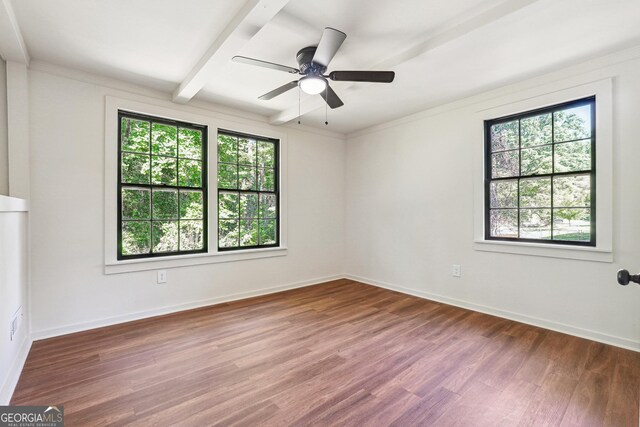 3708 Canadian Way, Tucker, GA 30084 - empty room with wood finished floors, baseboards, ceiling fan, and beamed ceiling