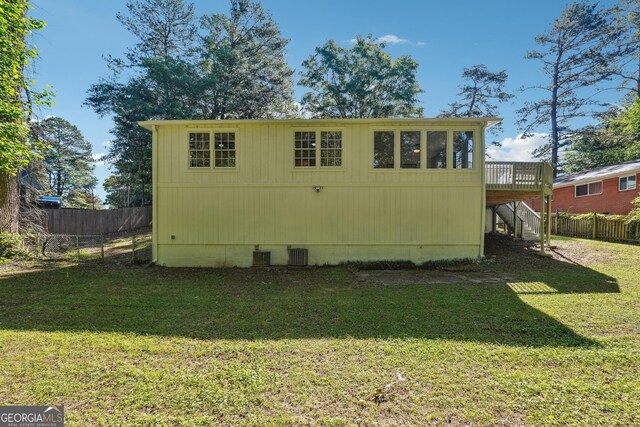 3708 Canadian Way, Tucker, GA 30084 - rear view of property featuring crawl space, stairway, a wooden deck, and central AC