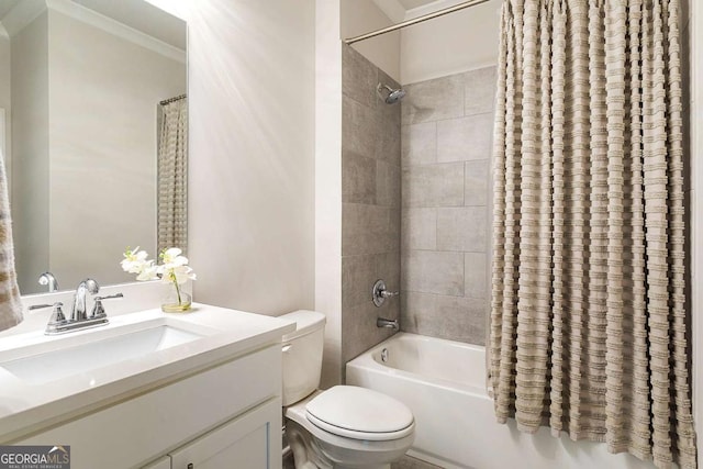 full bath with toilet, shower / bath combo, and vanity