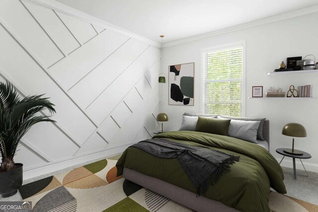 carpeted bedroom featuring crown molding and baseboards