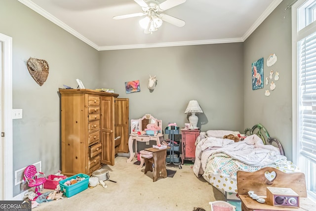 bedroom featuring carpet flooring, crown molding, and ceiling fan