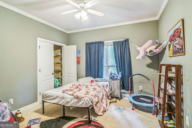 bedroom featuring carpet floors, crown molding, ceiling fan, and baseboards