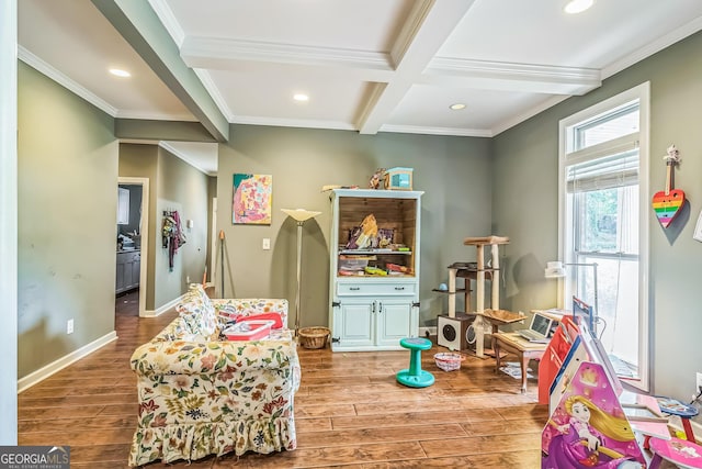 rec room with wood finished floors, beam ceiling, ornamental molding, recessed lighting, and baseboards