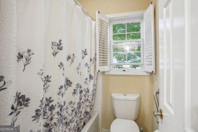 132 Eagles Club Dr, Stockbridge, GA 30281 - full bathroom featuring toilet and shower / bath combo with shower curtain
