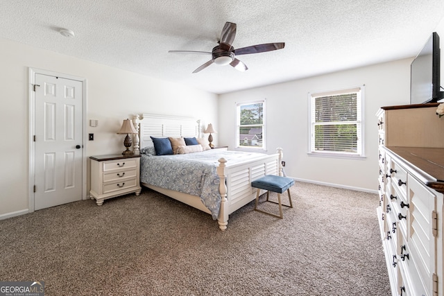 bedroom featuring a textured ceiling, carpet floors, ceiling fan, and baseboards