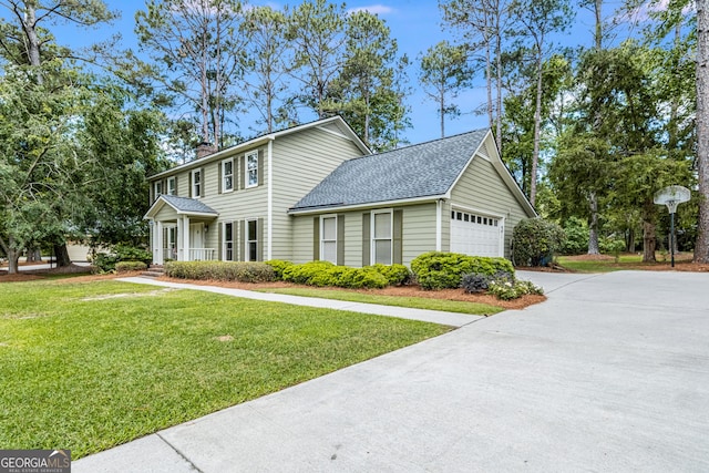 colonial inspired home featuring a front lawn, driveway, an attached garage, roof with shingles, and a chimney