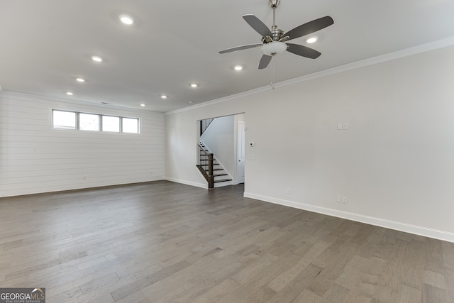 1023 Harvest Park Ln, Suwanee, GA 30024 - unfurnished room with crown molding, baseboards, stairway, recessed lighting, and dark wood finished floors