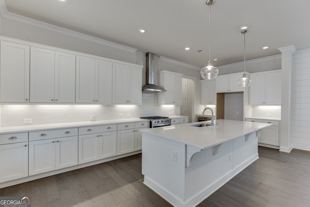 1023 Harvest Park Ln, Suwanee, GA 30024 - kitchen with wall chimney range hood, a sink, ornamental molding, backsplash, and dark wood-style flooring