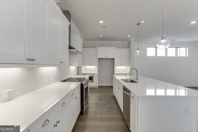 1023 Harvest Park Ln, Suwanee, GA 30024 - kitchen featuring appliances with stainless steel finishes, a sink, decorative backsplash, white cabinetry, and recessed lighting