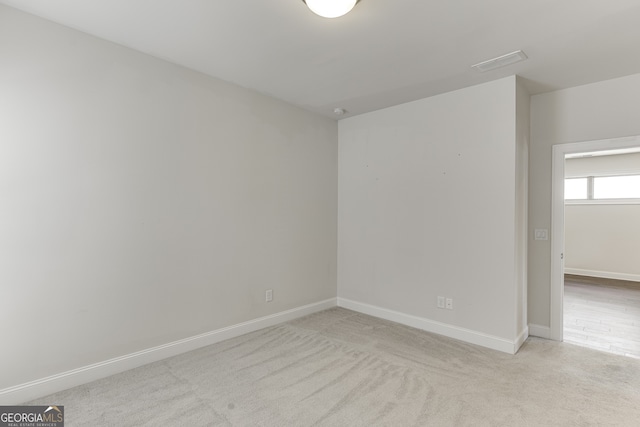 1023 Harvest Park Ln, Suwanee, GA 30024 - unfurnished room featuring light colored carpet and baseboards
