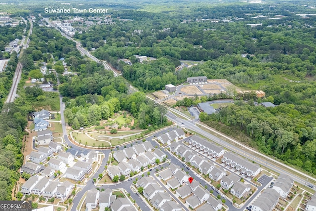 1023 Harvest Park Ln, Suwanee, GA 30024 - aerial perspective of suburban area with a forest