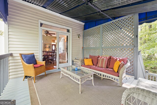 view of patio / terrace with an outdoor living space and a deck