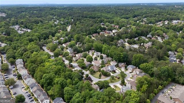 aerial view of residential area with a forest