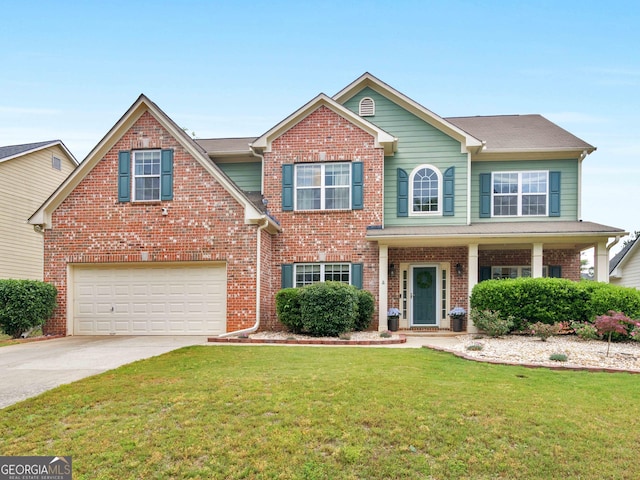 view of front of house with a garage, driveway, a front yard, and brick siding