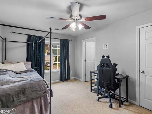 973 Buckhorn Bnd, Locust Grove, GA 30248 - bedroom with light colored carpet, baseboards, and a ceiling fan