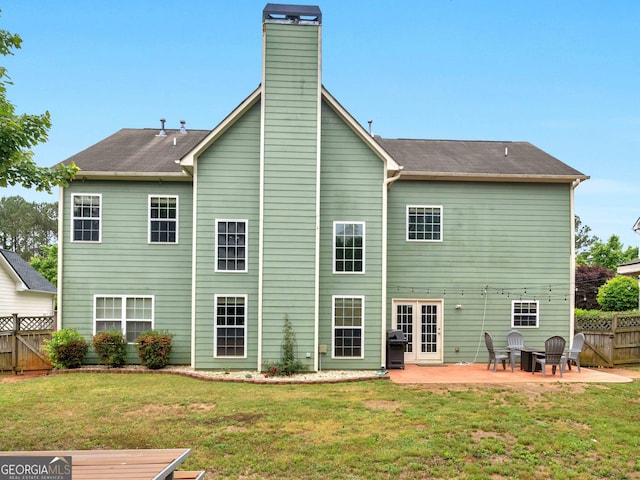 973 Buckhorn Bnd, Locust Grove, GA 30248 - rear view of house featuring a patio and a chimney