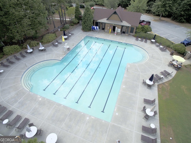 973 Buckhorn Bnd, Locust Grove, GA 30248 - community pool featuring a patio area