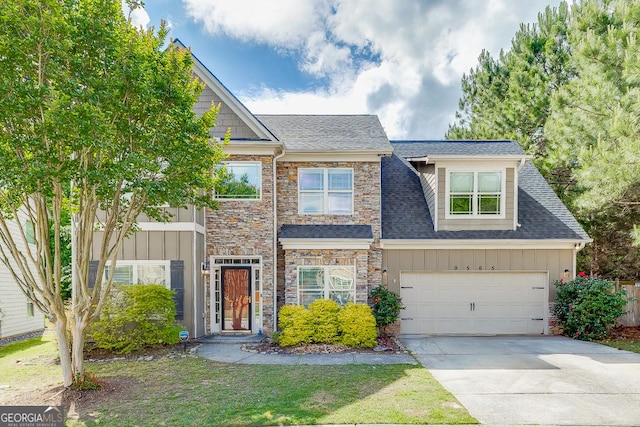 9565 Rushmore Cir, Braselton, GA 30517 - view of front of property with stone siding, concrete driveway, board and batten siding, a garage, and roof with shingles