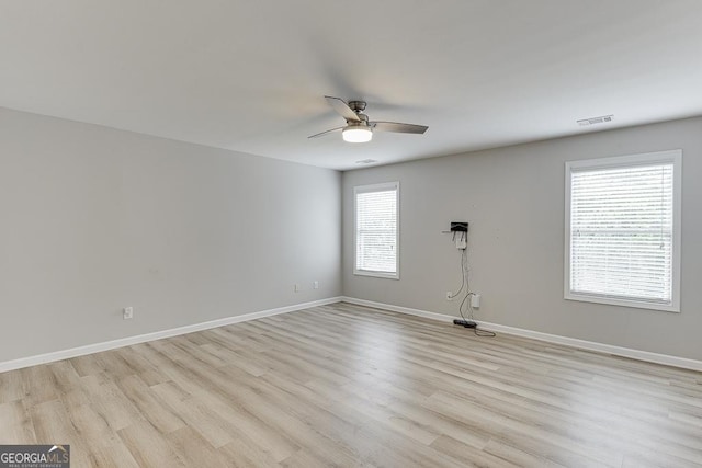 9565 Rushmore Cir, Braselton, GA 30517 - unfurnished room featuring a ceiling fan, light wood-style flooring, and baseboards