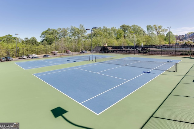 9565 Rushmore Cir, Braselton, GA 30517 - view of tennis court featuring community basketball court, fence, and view of scattered trees
