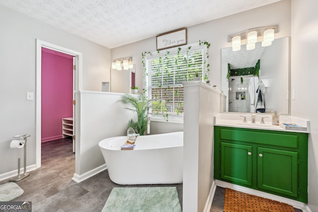 2349 June Springs Dr SW, Marietta, GA 30008 - bathroom with vanity, a freestanding tub, and a shower