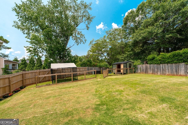 2349 June Springs Dr SW, Marietta, GA 30008 - view of yard featuring exterior structure and an outdoor structure