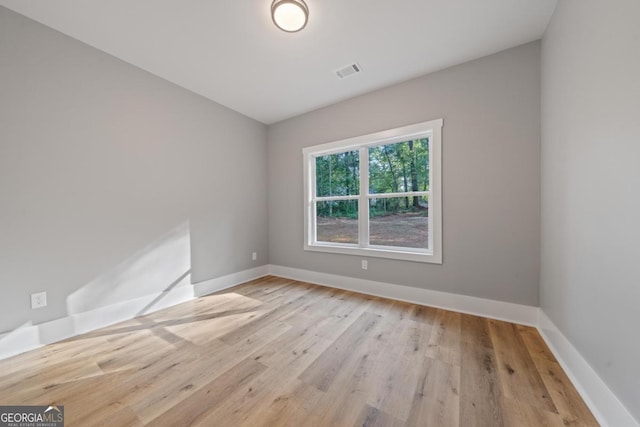 103 Spruce Ln, Eatonton, GA 31024 - empty room featuring wood finished floors and baseboards