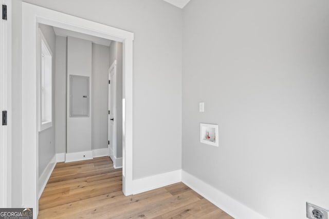103 Spruce Ln, Eatonton, GA 31024 - laundry room with electric panel, hookup for a washing machine, light wood-style floors, and electric dryer hookup