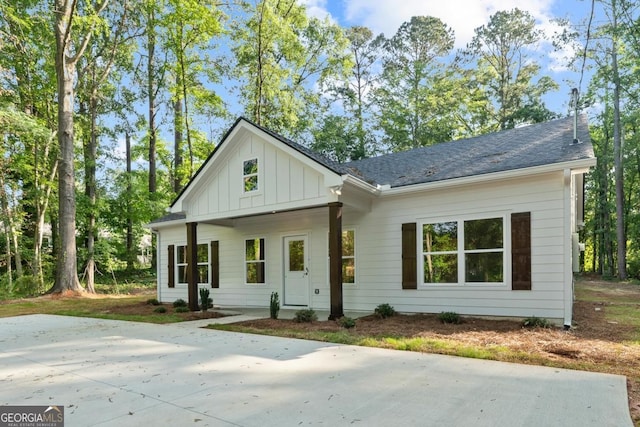 103 Spruce Ln, Eatonton, GA 31024 - modern inspired farmhouse with board and batten siding and a patio