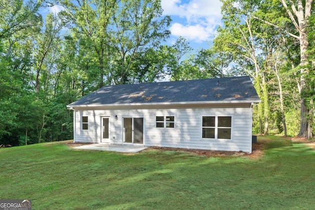 103 Spruce Ln, Eatonton, GA 31024 - back of house with a patio and a yard