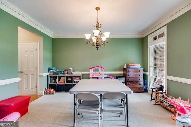 7511 Biltmore Ln, Douglasville, GA 30135 - dining room featuring a chandelier, crown molding, healthy amount of natural light, and carpet