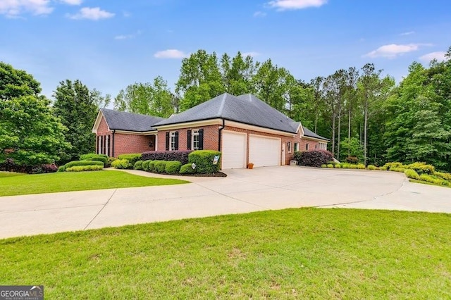 7511 Biltmore Ln, Douglasville, GA 30135 - view of front of home with a garage, brick siding, a front yard, driveway, and solar panels