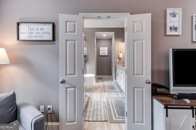 7511 Biltmore Ln, Douglasville, GA 30135 - bedroom with baseboards and ensuite bath