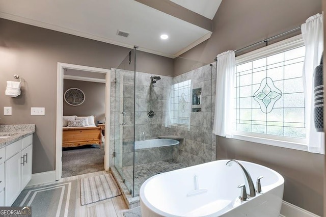 7511 Biltmore Ln, Douglasville, GA 30135 - bathroom featuring a shower stall, connected bathroom, a freestanding bath, baseboards, and crown molding