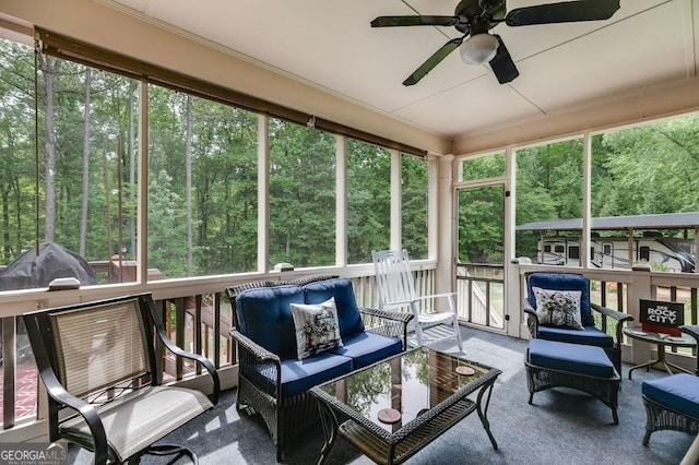 7511 Biltmore Ln, Douglasville, GA 30135 - sunroom featuring ceiling fan, an outdoor hangout area, and plenty of natural light