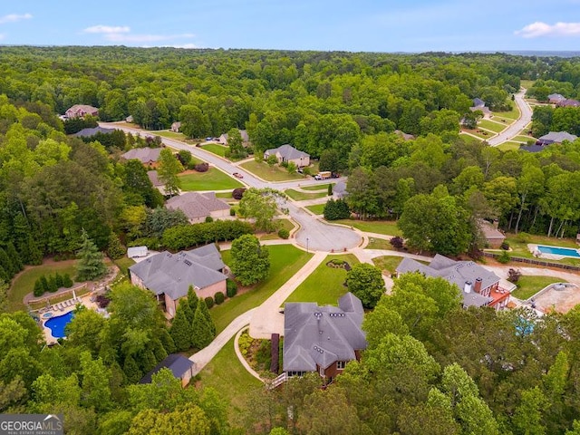 7511 Biltmore Ln, Douglasville, GA 30135 - aerial view of a forest and a pool