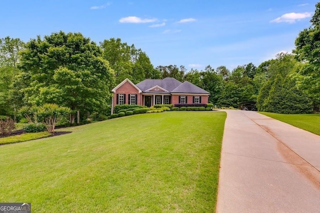 7511 Biltmore Ln, Douglasville, GA 30135 - view of front facade featuring a front yard and driveway