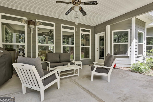 view of patio / terrace featuring a ceiling fan and an outdoor living space