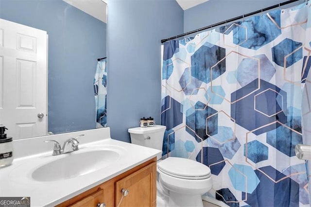 10 Bayberry Ct, Acworth, GA 30101 - bathroom featuring toilet, vanity, and curtained shower