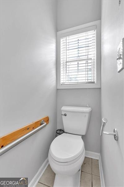 10 Bayberry Ct, Acworth, GA 30101 - bathroom featuring tile patterned floors, toilet, and baseboards
