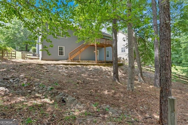 10 Bayberry Ct, Acworth, GA 30101 - view of yard featuring stairway, a deck, and fence