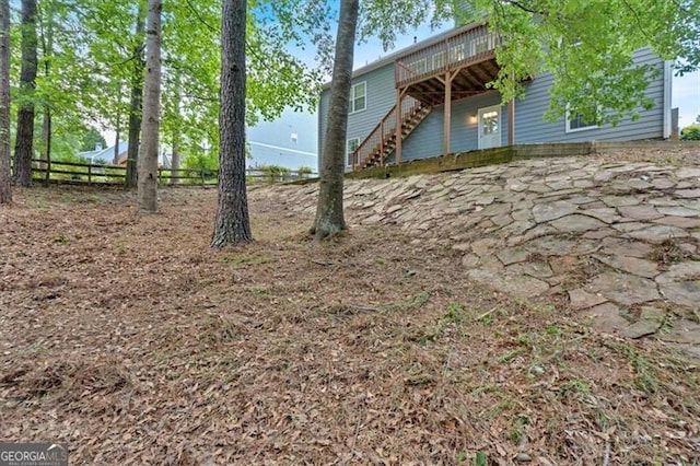 10 Bayberry Ct, Acworth, GA 30101 - view of yard with a deck, stairs, fence, and a patio