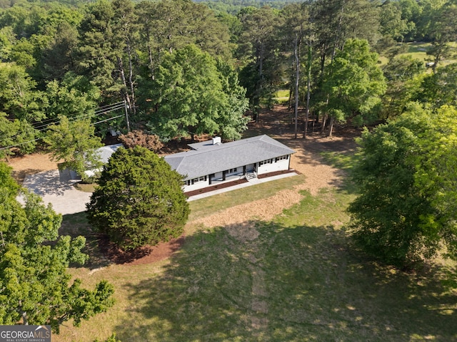 2604 Flat Shoals Rd SW, Conyers, GA 30094 - aerial view of property and surrounding area with a heavily wooded area