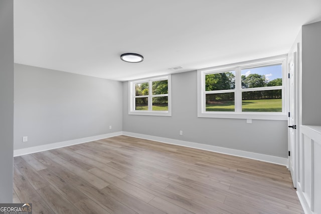 2604 Flat Shoals Rd SW, Conyers, GA 30094 - unfurnished room featuring light wood finished floors and baseboards