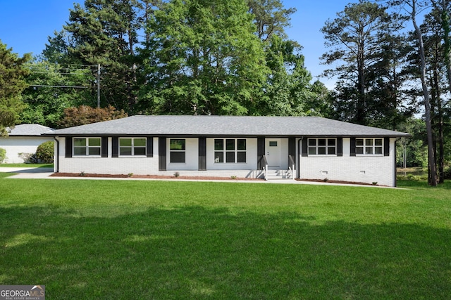 2604 Flat Shoals Rd SW, Conyers, GA 30094 - ranch-style house featuring a front lawn and brick siding